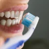 Young-woman-brushing-teeth